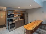 open shelf kitchen with live edge dining table